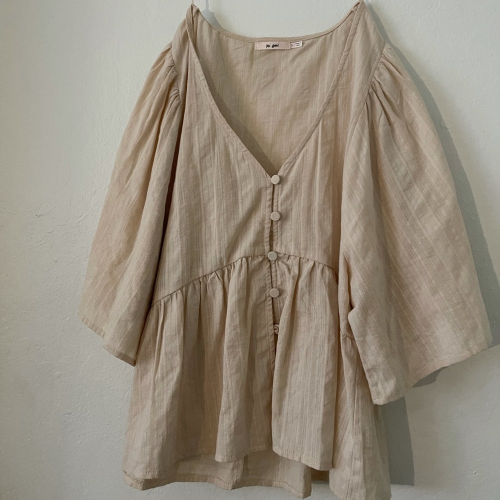 tan blouse